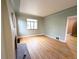 Spacious living room with hardwood floors, neutral walls, and abundant natural light at 2710 Stuart St, Denver, CO 80212