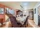 Elegant dining room with hardwood floors, stylish furnishings, and ample natural light at 5420 E 61St Way, Commerce City, CO 80022