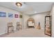 Finished basement playroom with seating and shelving at 7706 S Duquesne Way, Aurora, CO 80016