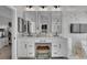 Elegant bathroom with double vanity and marble tile at 7706 S Duquesne Way, Aurora, CO 80016