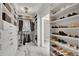 Well-organized closet offering extensive storage solutions at 7706 S Duquesne Way, Aurora, CO 80016