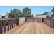 Spacious wooden deck offering an inviting outdoor living space at 9995 E Harvard Ave # 166, Denver, CO 80231