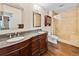 Primary bathroom featuring dual sinks, granite countertops, and a glass enclosed shower at 2121 Enterprise St, Superior, CO 80027