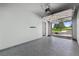 View of the garage with an epoxy floor and garage door leading to the outdoors at 2121 Enterprise St, Superior, CO 80027