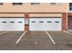 Close-up of parking and garage doors in a multi-unit building at 3611 W 79Th Ave # B4, Westminster, CO 80030