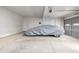 Spacious garage with concrete floor and covered car at 3611 W 79Th Ave # B4, Westminster, CO 80030