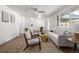 Stylish living room with wood floors, white walls, and lots of natural light at 3611 W 79Th Ave # B4, Westminster, CO 80030