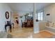 Elegant dining room with hardwood floors, wooden dining set, and staircase at 1995 E 166Th Ave, Thornton, CO 80602