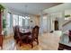 Elegant dining room with hardwood floors and wooden dining set at 1995 E 166Th Ave, Thornton, CO 80602