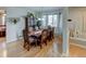 Elegant dining room with hardwood floors and wooden dining set at 1995 E 166Th Ave, Thornton, CO 80602