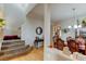 Elegant dining room with hardwood floors, wooden dining set, and staircase at 1995 E 166Th Ave, Thornton, CO 80602