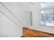 Bright foyer featuring hardwood floors, a staircase, and ample natural light at 9436 Cody Dr, Broomfield, CO 80021