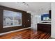 Bright living area showcasing hardwood floors and seamless transitions to the modern kitchen at 9436 Cody Dr, Broomfield, CO 80021