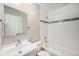 Bathroom featuring modern fixtures, and a shower/tub combo with white subway tile at 2239 S Jasper Way # A, Aurora, CO 80013