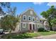 Charming two-story home with landscaped front yard, beautiful windows and inviting red front door at 2239 S Jasper Way # A, Aurora, CO 80013