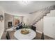 Bright living room with a stylish fireplace, hardwood floors, and staircase at 2239 S Jasper Way # A, Aurora, CO 80013