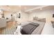 Tastefully decorated bedroom with a plush rug and ample space for relaxation and rest at 6537 Everett St, Arvada, CO 80004