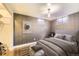 Cozy bedroom with soft lighting and modern decor for a serene and stylish atmosphere at 6537 Everett St, Arvada, CO 80004