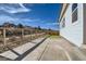 A well-maintained backyard boasts a concrete patio and a beautifully landscaped garden area, providing a relaxing outdoor space at 2750 E 102Nd Pl, Thornton, CO 80229