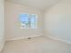 Neutral bedroom with carpet and windows offering neighborhood views at 2750 E 102Nd Pl, Thornton, CO 80229
