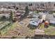 Aerial view showcases the backyard with trampoline and proximity to neighborhood amenities at 11360 Irma Dr, Northglenn, CO 80233