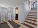 Finished basement area featuring a staircase and laundry area at 405 S University Blvd, Denver, CO 80209