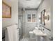 Modern bathroom with a glass shower and vanity at 405 S University Blvd, Denver, CO 80209
