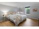 Cozy bedroom features a comfortable bed with plush pillows and a neutral color palette at 405 S University Blvd, Denver, CO 80209