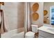 Bathroom with shower/tub combo and white vanity at 4306 Canyata Dr, Elizabeth, CO 80107