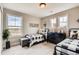 Twins bedroom with black metal beds and matching decor at 4306 Canyata Dr, Elizabeth, CO 80107