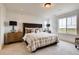 Main bedroom with shiplap accent wall and large window at 4306 Canyata Dr, Elizabeth, CO 80107