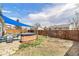 Backyard with hot tub and a privacy fence at 12418 Albion St, Thornton, CO 80241