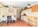 Inviting dining area with wood flooring and space for a table for four people at 12418 Albion St, Thornton, CO 80241