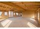 Unfinished bonus room, newly framed with lots of natural light, and walk-out to deck at 8280 Queen St, Arvada, CO 80005