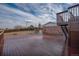 Large wood deck with dark stain and railing showing great outdoor space at 8280 Queen St, Arvada, CO 80005