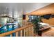 View from the bedroom that overlooks the large indoor pool at 8280 Queen St, Arvada, CO 80005