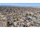 An aerial view of homes in a neighborhood, some with solar panels at 2645 Jasmine St, Denver, CO 80207