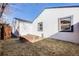 Exterior of home and yard featuring new construction, privacy fence and modern design at 2645 Jasmine St, Denver, CO 80207