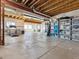 Spacious unfinished basement providing ample storage or potential for customization at 11426 Box Turtle Ct, Parker, CO 80134