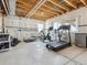 Spacious basement area featuring work out equipment with a well lit area at 11426 Box Turtle Ct, Parker, CO 80134