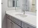 Bathroom featuring a single sink vanity, a mirror, and a shower with a bathtub combination at 11426 Box Turtle Ct, Parker, CO 80134