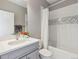 Cozy bathroom featuring a vanity with a sink, a toilet, and a shower with a bathtub combination at 11426 Box Turtle Ct, Parker, CO 80134