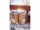 Charming outdoor firepit area with Adirondack chairs and string lights, perfect for cozy evenings at 3130 S Krameria St, Denver, CO 80222