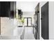 Bright, modern kitchen with stainless steel appliances, white countertops, and backyard views at 3130 S Krameria St, Denver, CO 80222