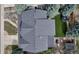 Birds eye aerial view of the house with landscaping, hardscaping, patio and backyard at 10046 Brisbane Ln, Highlands Ranch, CO 80130