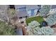 Aerial view of backyard with patio, green lawn, trampoline and outdoor furniture at 10046 Brisbane Ln, Highlands Ranch, CO 80130