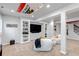 Finished basement with built-in shelving, media center, and comfortable beanbag seating at 10046 Brisbane Ln, Highlands Ranch, CO 80130