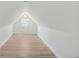 Bright attic room with natural light, clean lines, and a cozy atmosphere at 1601 Robb St, Lakewood, CO 80215