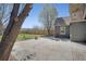 Spacious backyard featuring a patio area and well-maintained yard at 1601 Robb St, Lakewood, CO 80215