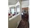 Open-concept interior view of the living room, dining area, and kitchen at 1890 Bel Lago Vw, Monument, CO 80132